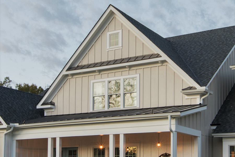 A simple one-and-a-half story home with battens that give it a barn style feel.