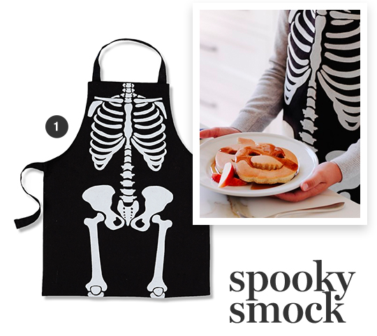 Black-Skeleton-Smock-Alongside-Pumpkin-Pancake-Plate-And-Red-Apple-Slices