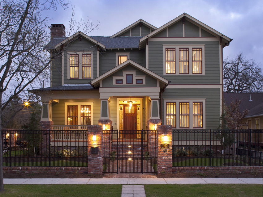 Craftsman-House-In-Night-Gray-HardiePlank-Lap-Siding-With-Black-Fence-And-Stone-Walkway