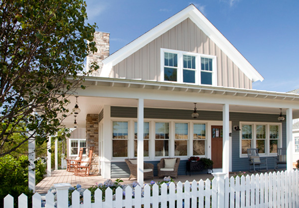 White-Picket-Fencing-Surrounding-Tan-Two-Story-Home